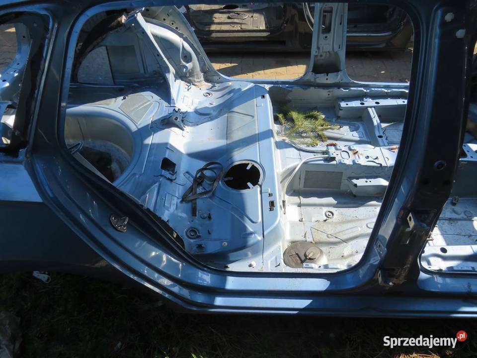 PRÓG SŁUPEK PRAWY BOK SKODA RAPID 14R Części samochodowe