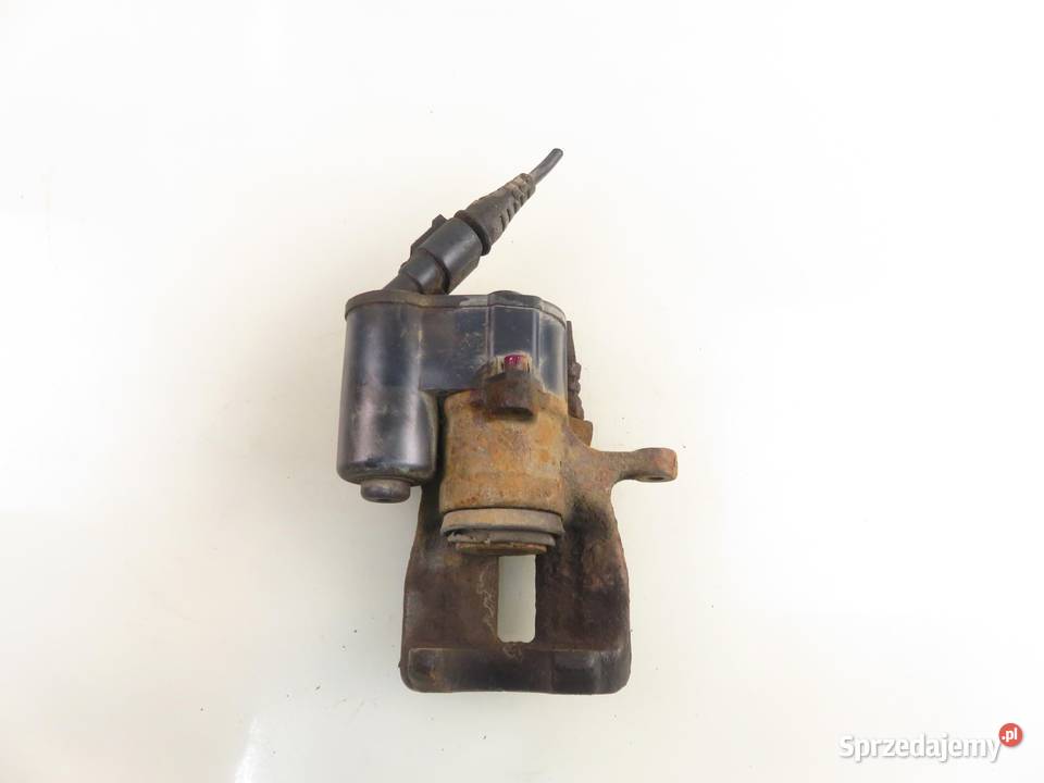 ZACISK PRAWY TYŁ AUDI A6 C6 30 TDI