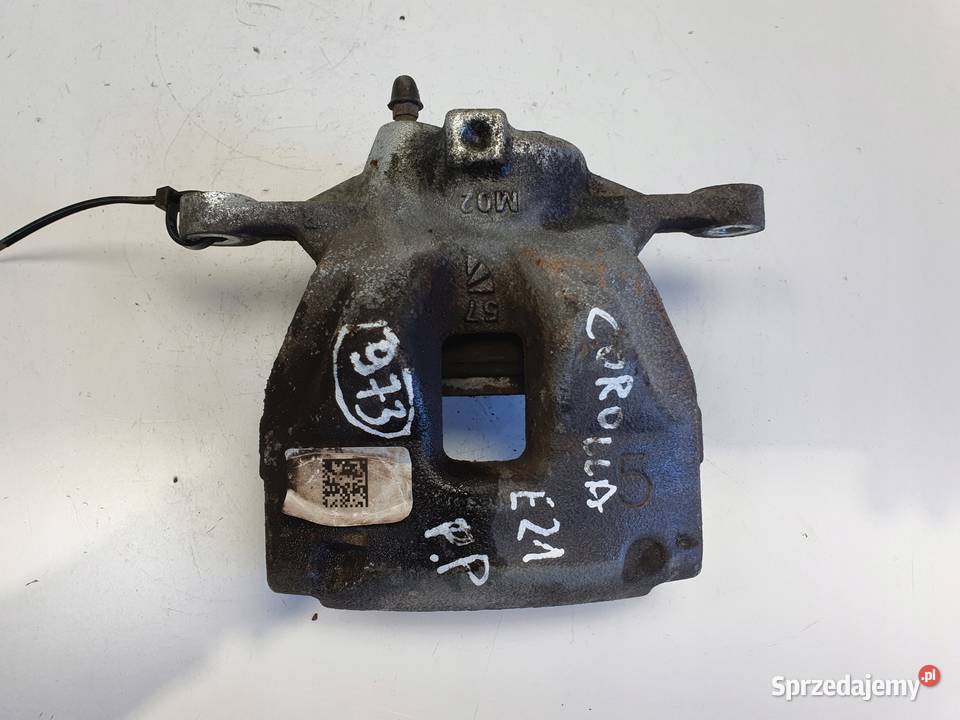 Toyota Corolla XII E21 PRZEDNI ZACISK HAMULCOWY Motoryzacja Janów