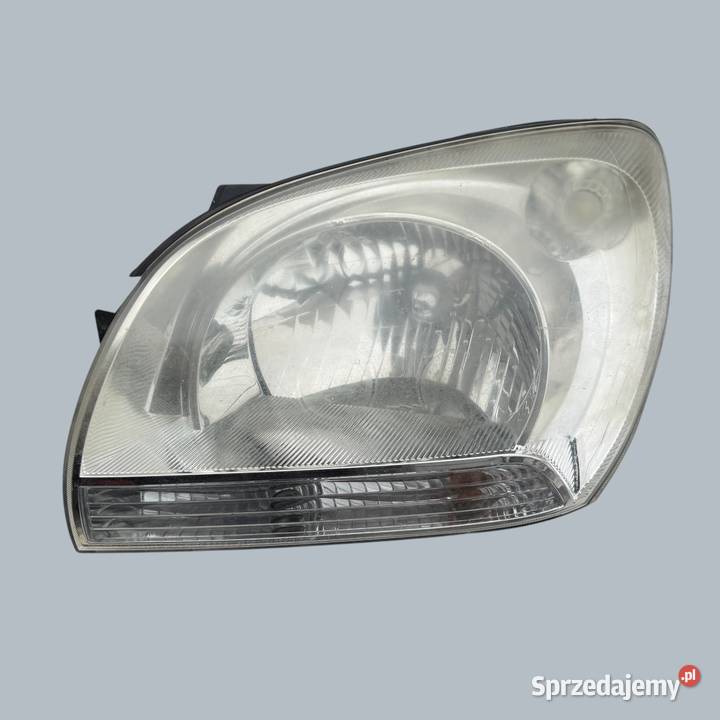 Lampa przednie reflektor lewy lewa Kia Sportage