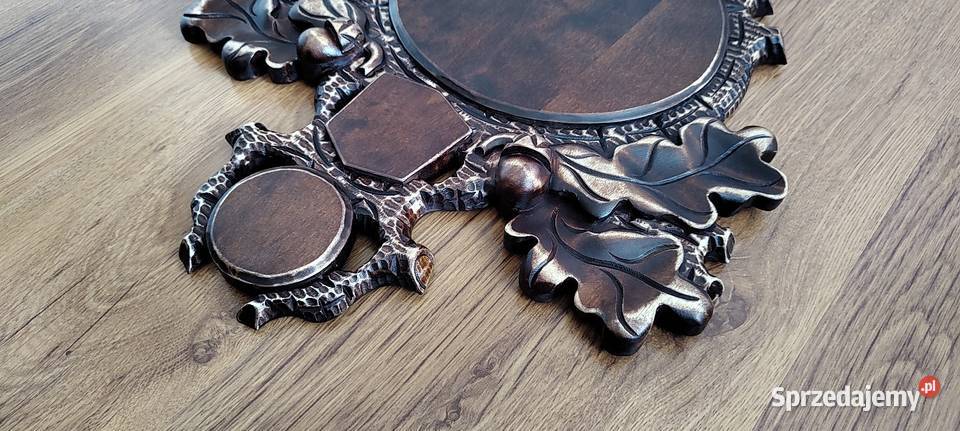 Rzeźbiona podkładka pod medalowy oręż dzika Odolanów