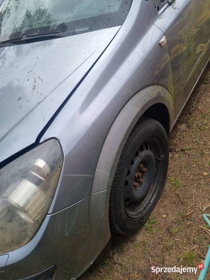 Błotnik Opel Astra h kombi