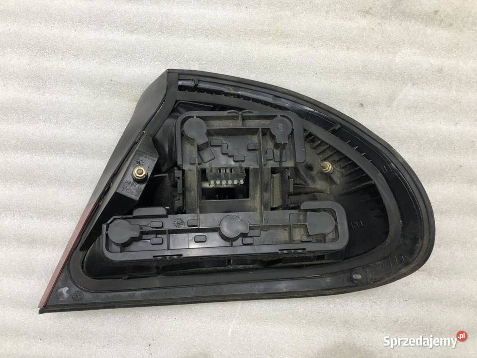 LAMPA LEWA LEWY TYŁ TYLNA OPEL TIGRA 90482000 Lampy tylne wielkopolskie sprzedam
