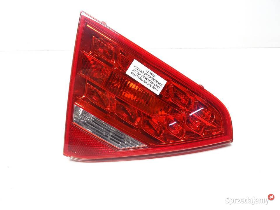 LAMPA LEWA LEWY TYŁ TYLNA W KLAPĘ 8T0945093A osobowe Lampy tylne