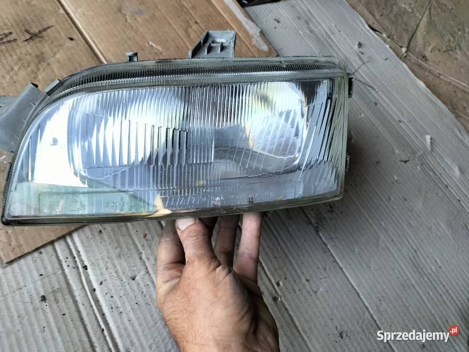 LAMPA PRZÓD PRZEDNIA LEWA REFLEKTOR FIAT PUNTO 1