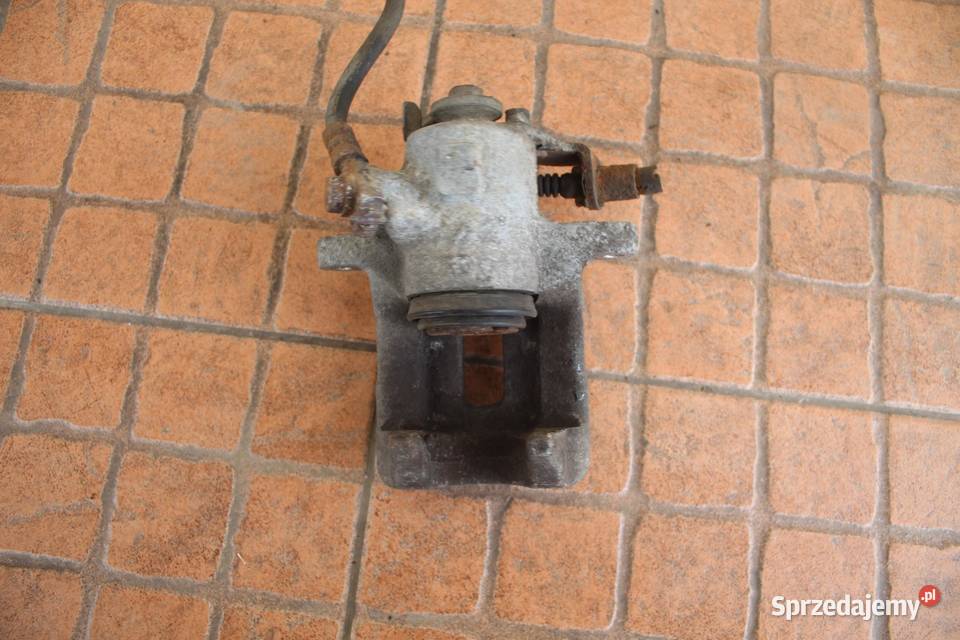 ZACISK HAMULCOWY PRAWY TYŁ AUDI A4 B6 25 TDI