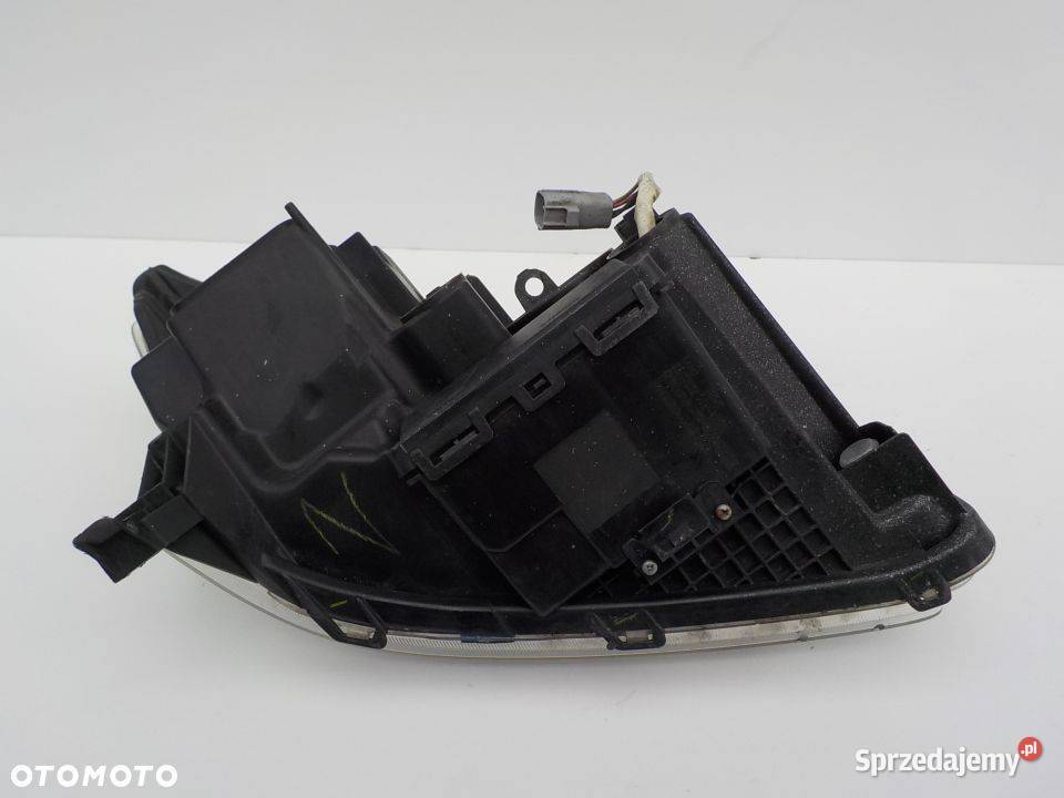 REFLEKTOR LAMPA LEWY PRZÓD TOYOTA UPM606F20 osobowe Oświetlenie Nowy Tomyśl