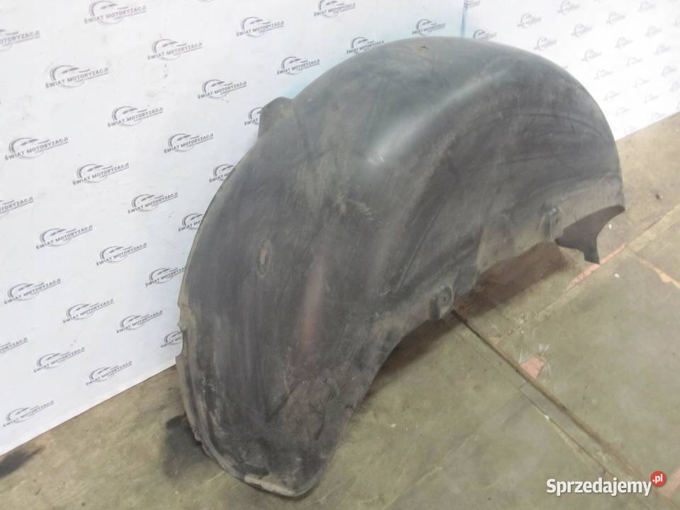 VOLKSWAGEN CADDY III nadkole lewe tył 2K5810971A Nadkola