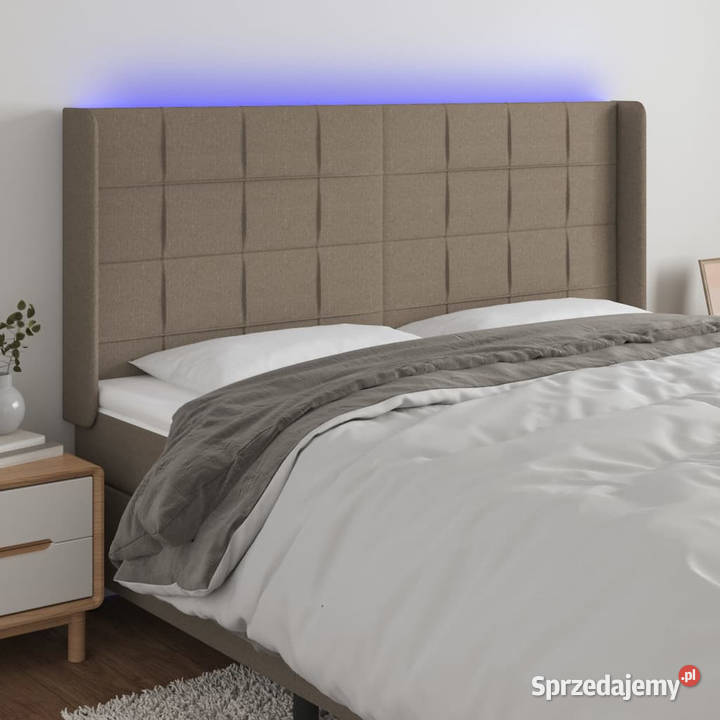 Zagłówek do łóżka z LED taupe 203x16x118128 sprzedam