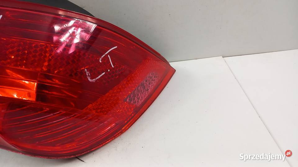 PEUGEOT 308 T7 HB LAMPA TYŁ LEWY osobowe Zbierkowo