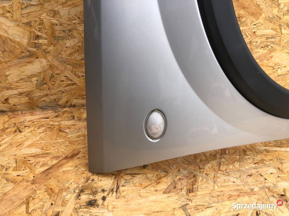 Opel Corsa C LIFT Z157 Błotnik przód prawy Słowikowo