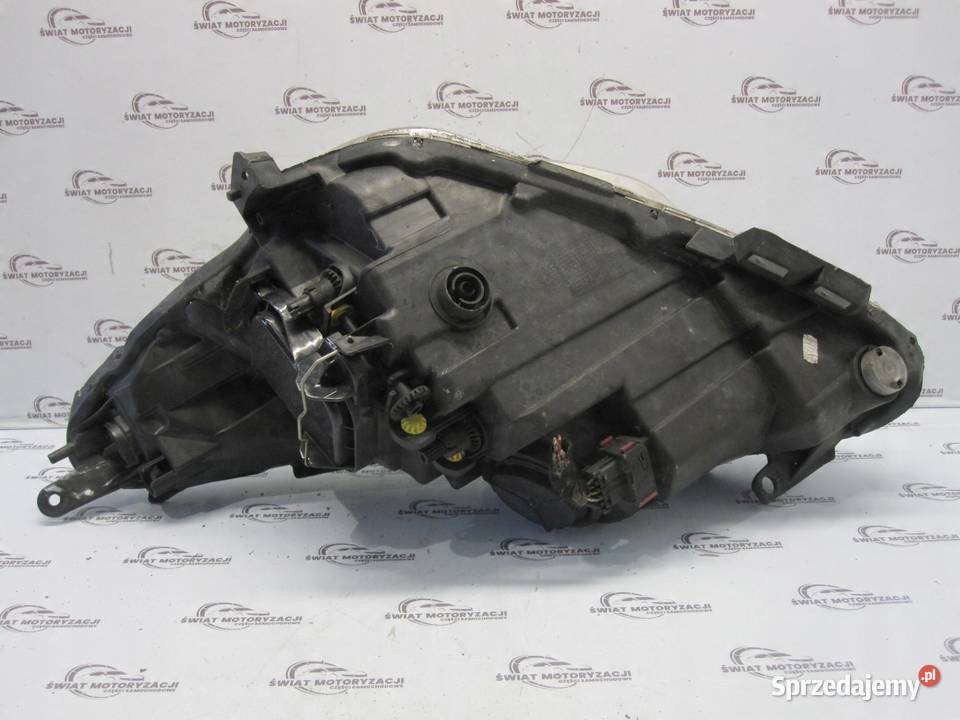 OPEL CORSA D lampa prawa przód 13432892 90003113