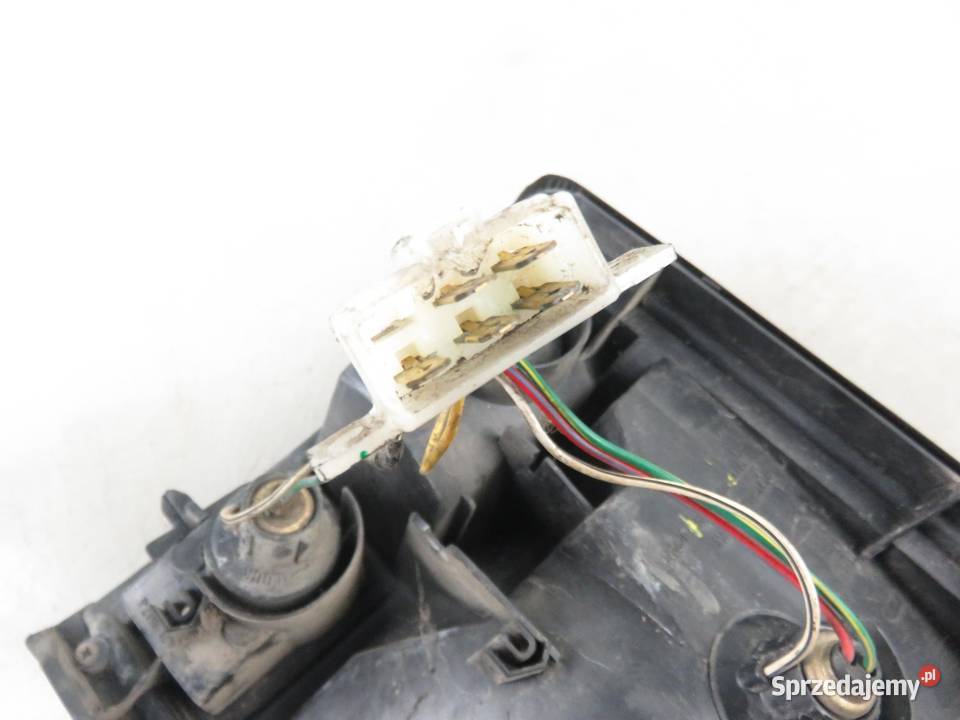 LAMPA PRAWA TYLNA DAIHATSU CUORE III 22051289 Lampy tylne sprzedam