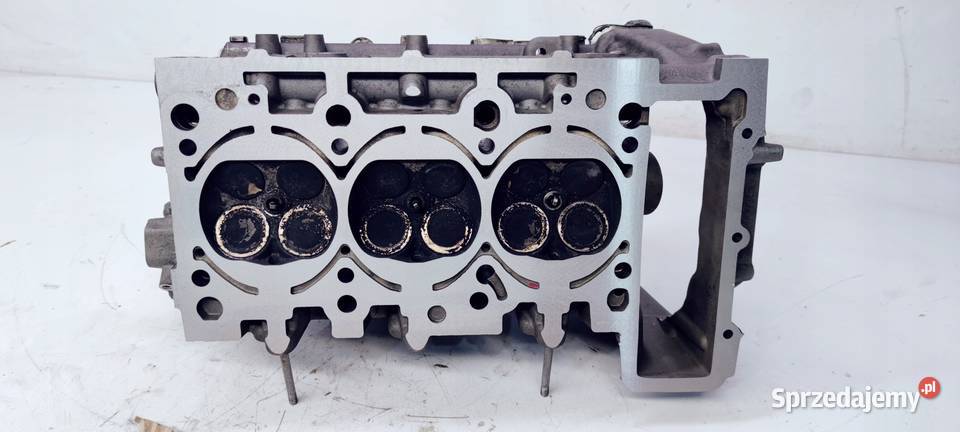 GŁOWICA LEWA AUDI A4 B7 A6 C6 32 FSI 06E103373E Przystajń