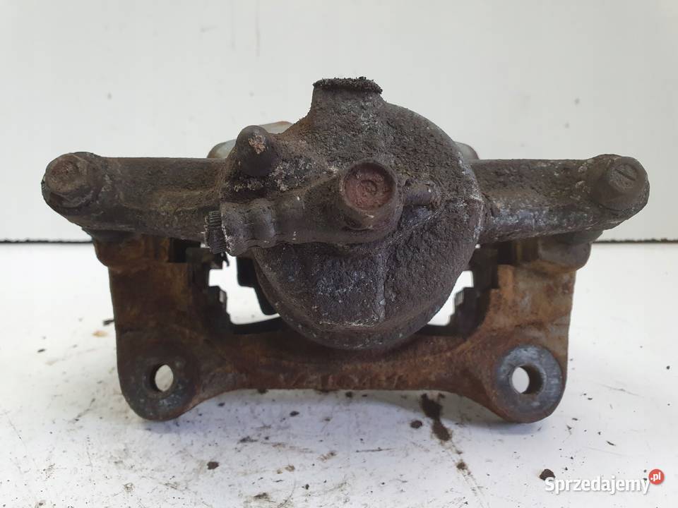 Toyota Corolla XII E21 PRAWY PRZEDNI ZACISK osobowe Rudka