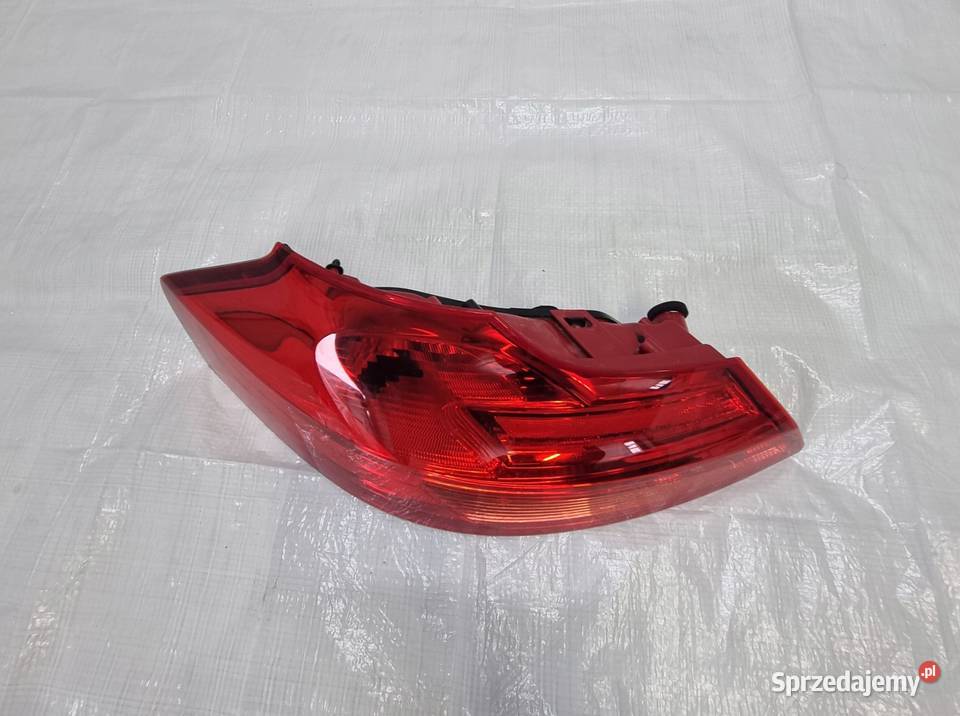 OPEL INSIGNIA A KOMBI 22950973 LAMPA TYŁ LEWA