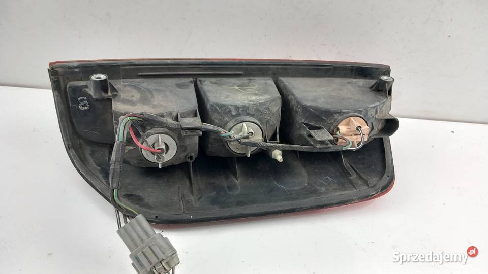NISSAN NAVARA D40 LIFT SUV LAMPA TYŁ LEWA Światła stop