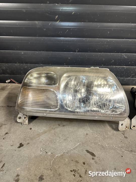 10032080 Reflektory suzuki grand vitara KOITO Łazy