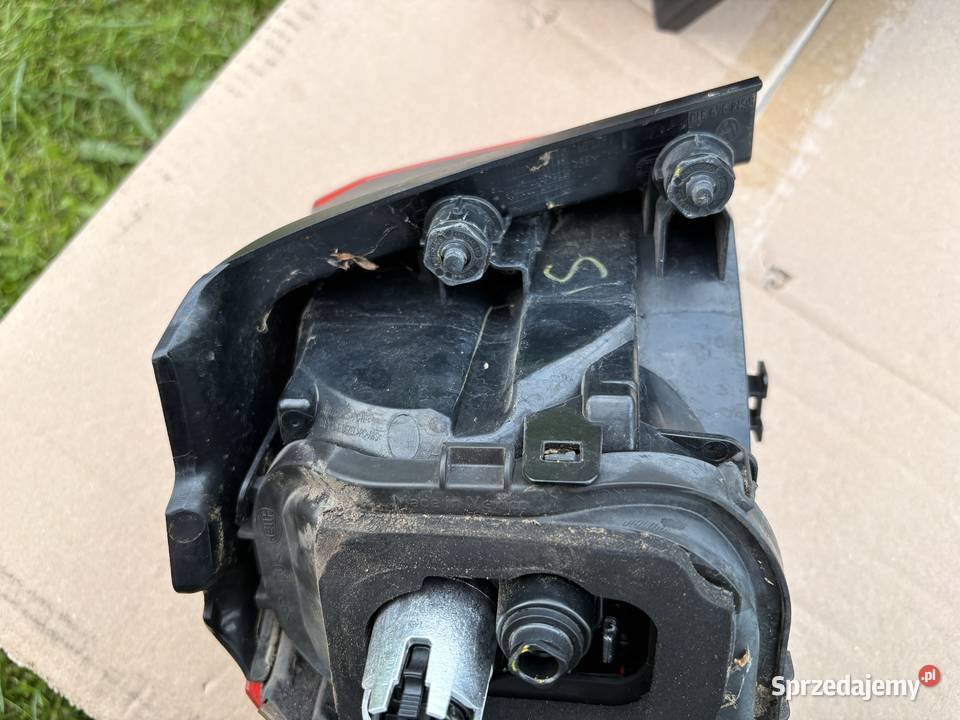 Oryginalne tylne lampy VW Golf 7 HELLA komplet