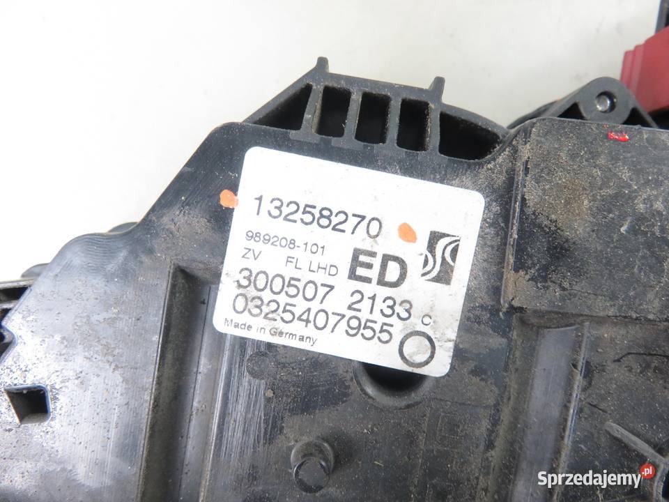 ZAMEK LEWY PRZEDNI OPEL CORSA D