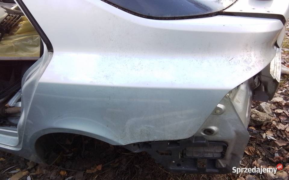 Renault Laguna 2 sedan błotnik lewy tył TEB64