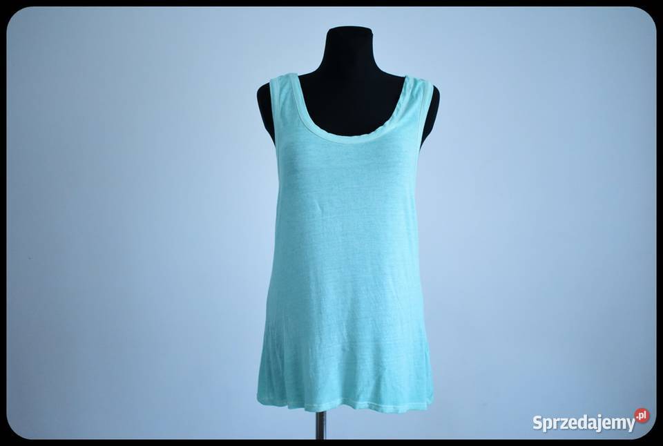 Miętowa bokserka mocno wycięta narzutka bluzka zielony