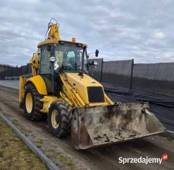 Koparko Ładowarka Holland NH95 BRUTTO Rok produkcji 2000 warmińsko-mazurskie Dywity