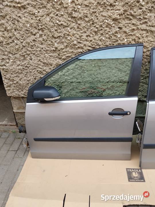 Drzwi VW Polo IV 9N 9N3 kompletne srebrne LA7W Zbąszyń sprzedam