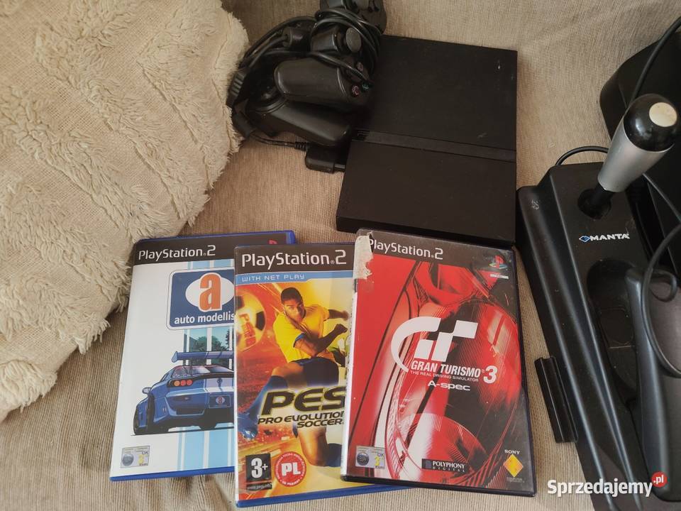 Konsola Sony 2 czarna kierownica 2 pady i gry Sony Playstation 2 Warszawa