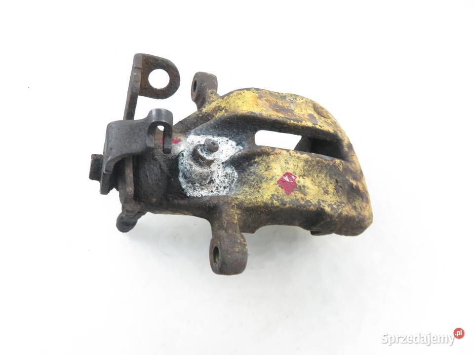 ZACISK LEWY TYŁ AUDI 80 B4 19
