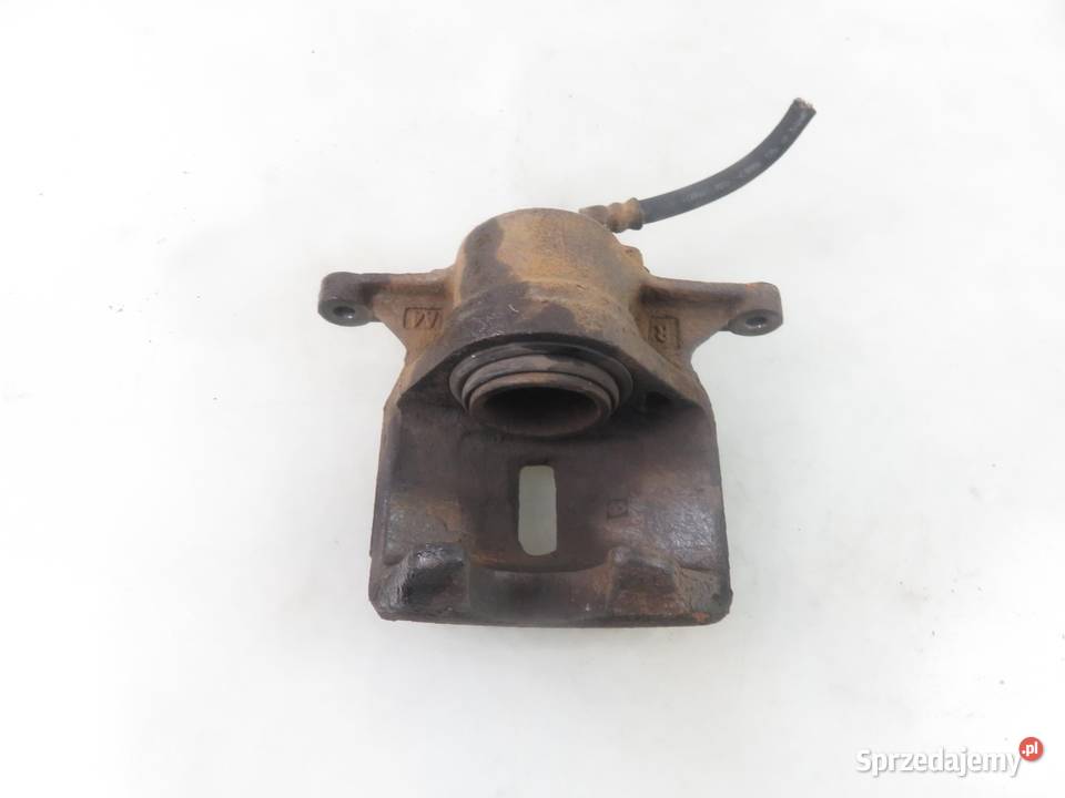 ZACISK PRAWY PRZÓD TOYOTA COROLLA VIII E11 20 osobowe