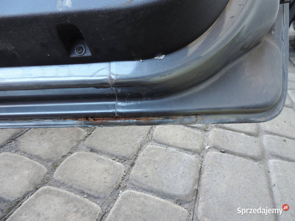 FIAT GRANDE PUNTO 5D DRZWI LEWY PRZÓD 634C osobowe Nowy Sącz