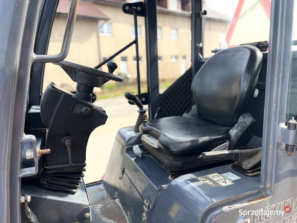 Ładowarka Flexitrac 1236 z łyżką i widłami Małkowo