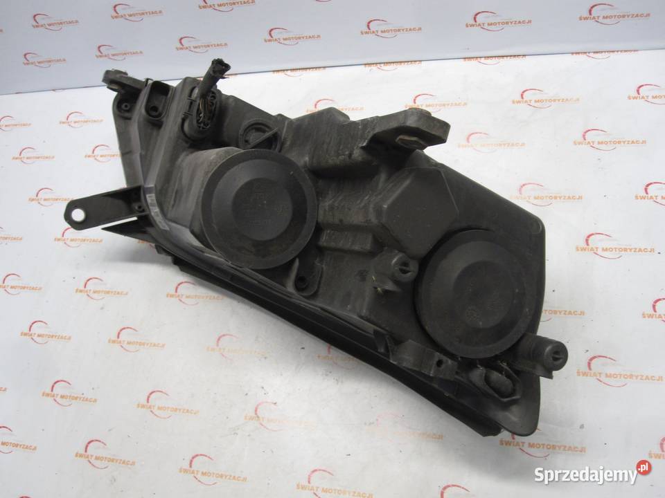 VOLKSWAGEN TIGUAN I 10r lampa lewa przód ANGLIK osobowe świętokrzyskie Kielce