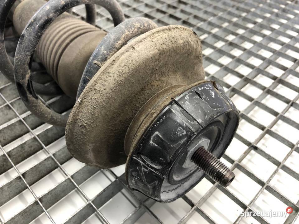 AMORTYZATOR LEWY TYŁ ZE SPRĘŻYNĄ DACIA DUSTER Zawieszenie i amortyzacja