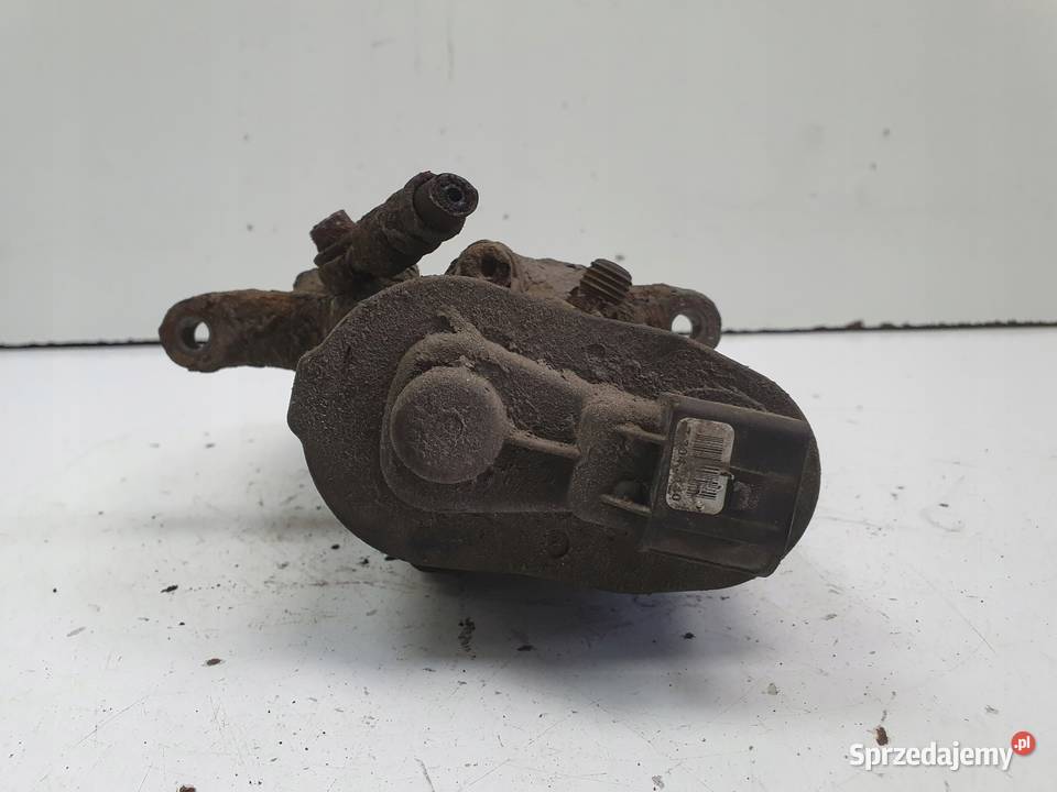 Volvo S60II XC60 TYLNY ZACISK HAMULCOWY LEWY tył osobowe Chełm