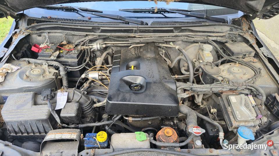 Suzuki Grand Vitara 2 ZJ3 CZĘŚCI Maska Błotnik