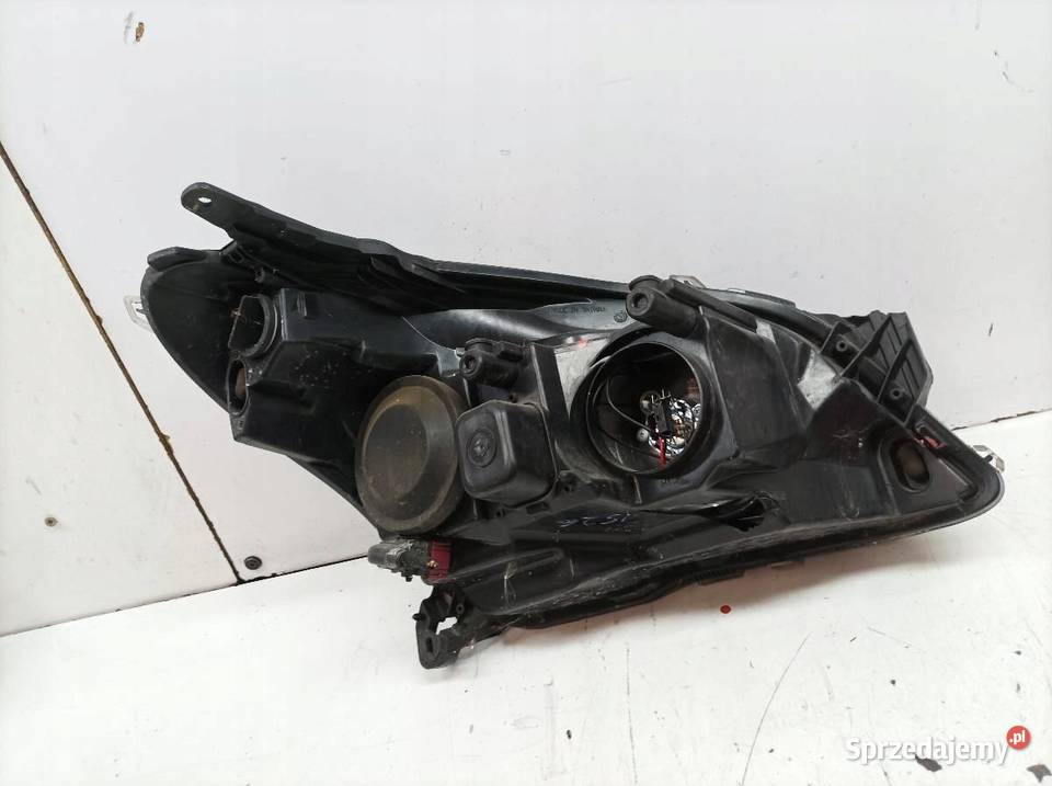 LAMPA PRZÓD LEWA EU USZKODZONA Opel Astra III osobowe