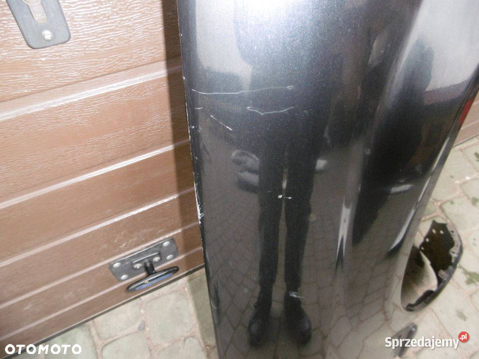 Błotnik prawy MAZDA 323