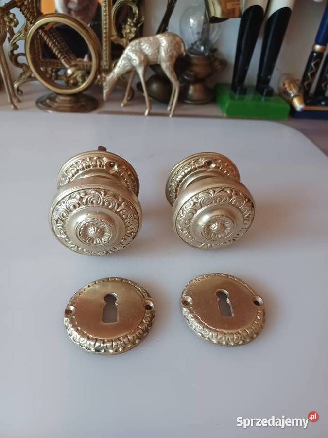 Gałki mosiężne obrotowe z rozetami do drzwi Klamki i uchwyty Poznań