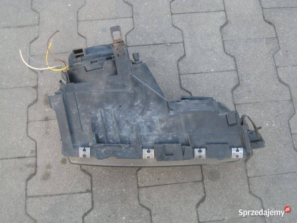 ford sierra 8793r lampa przód lewa oryginalna osobowe Lampy przednie Motoryzacja Rakoniewice
