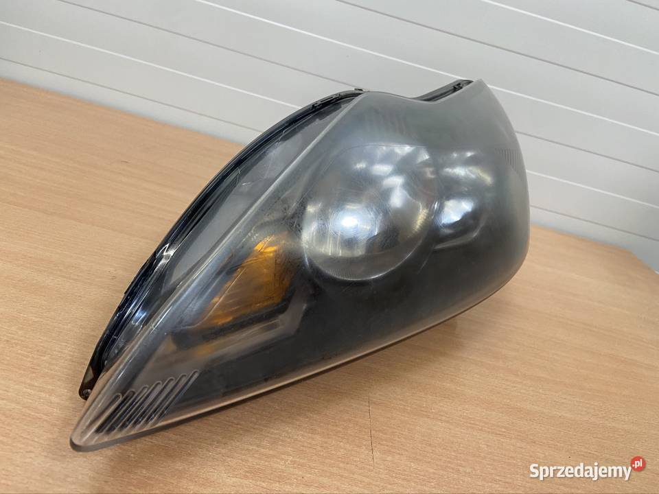 Reflektor lampa lewy czarny Ford Focus mk2 FL