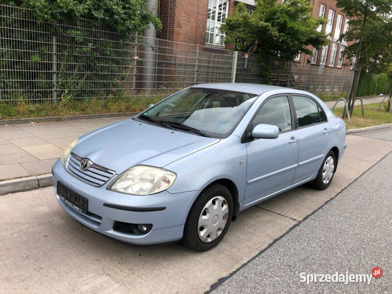 COROLLA E12 drzwi lewy tył czerwoną bez