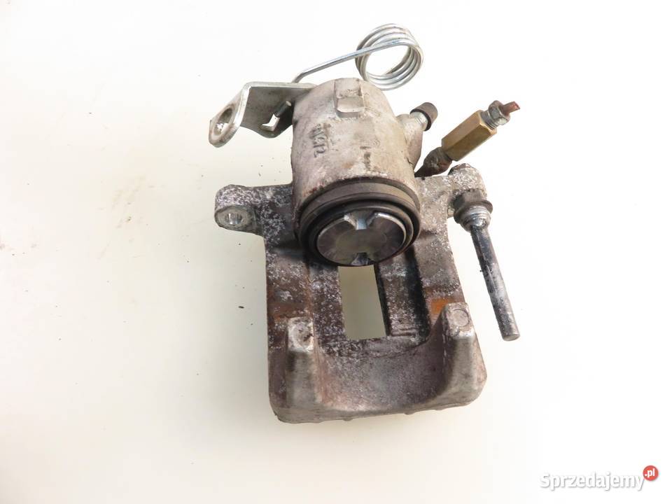 ZACISK LEWY TYŁ SEAT TOLEDO II 1M2 18 20V 125