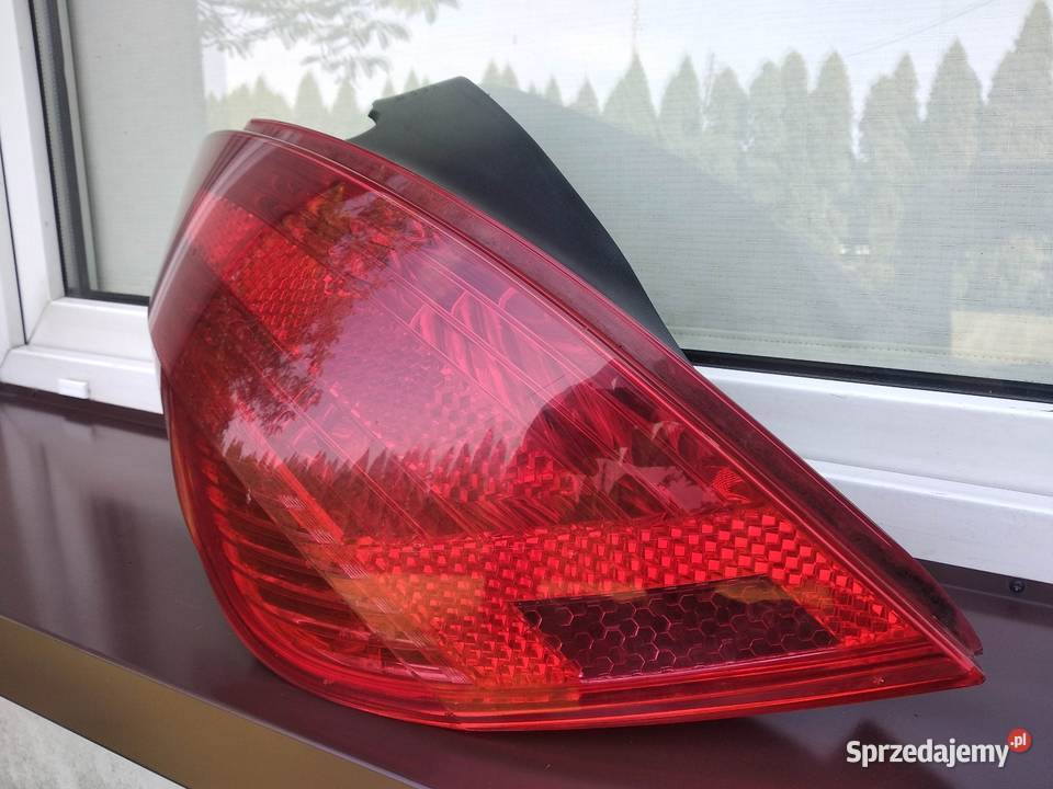 Peugeot 308 T7 hatchback lampa tył tylna lewa Lampy tylne Sieradz