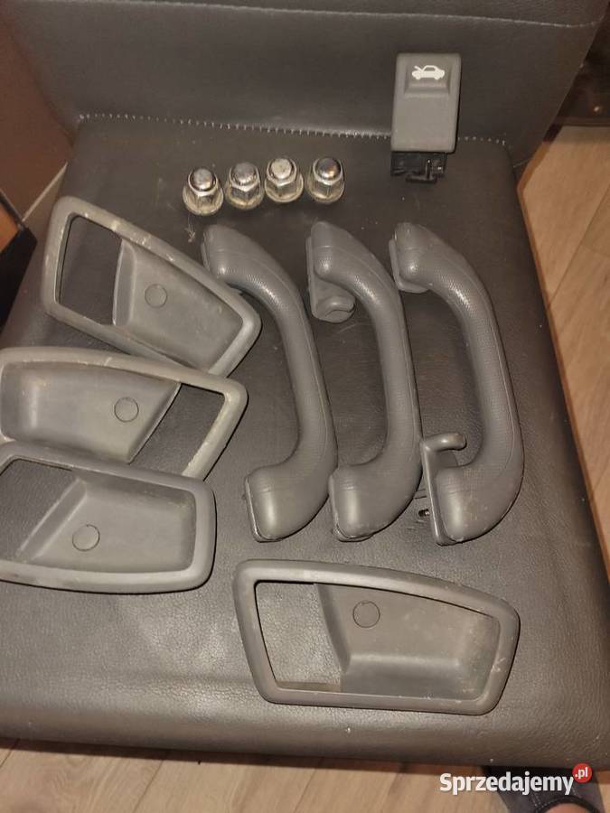 kia carens II 4 Sruby do kół 3 uchwyty4 obudowy osobowe Wyposażenie wnętrza