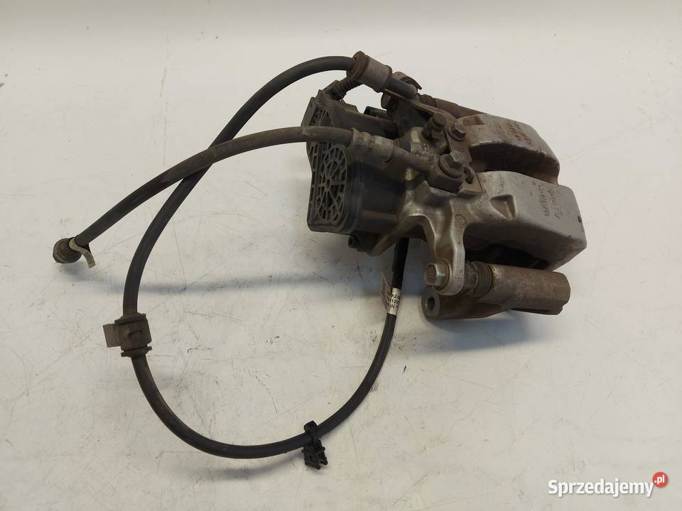 TESLA MODEL Y 2024r ZACISK HAMULCOWY PRAWY TYŁ dolnośląskie