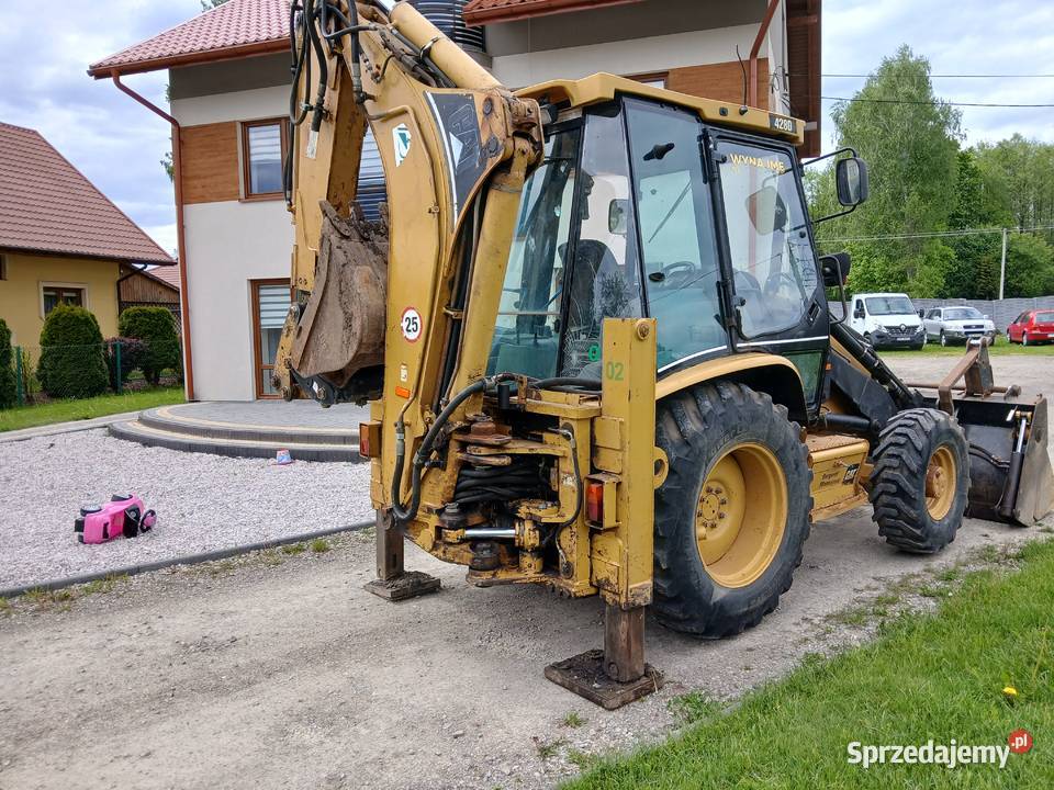 Koparko ładowarka cat 428d 03r Giedlarowa