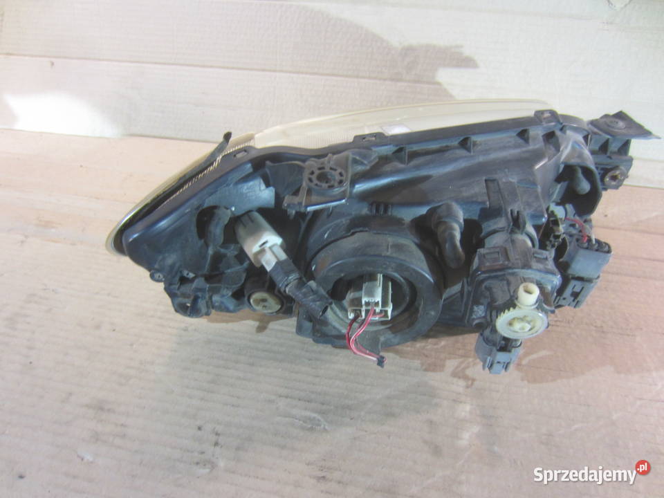lampa lewa przód przednia mazda 323 bj Lewe