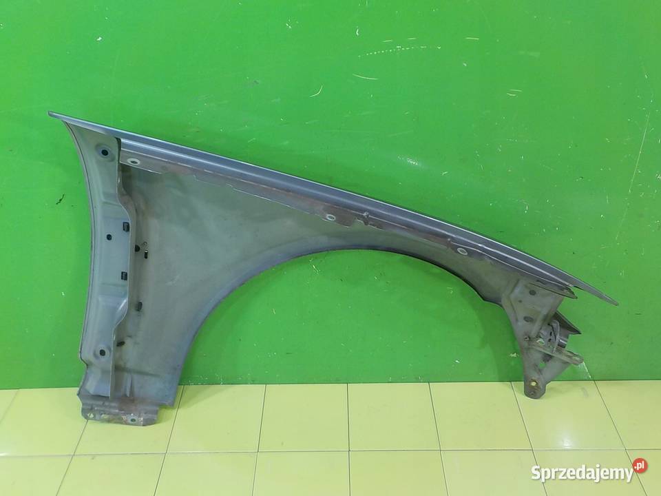 JAGUAR XF I 09r SEDAN 4D blotnik lewy przod osobowe